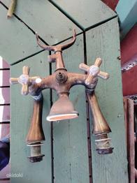 Aadlik kraan vannitoa jaoks vanast majast